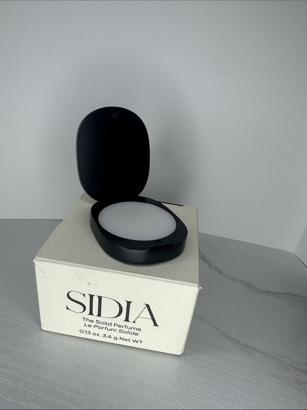 Solid Perfume Balm in Black - Compact Lip & Fragrance Balm